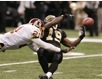 capt.nua10412171942.redskins_saints_football_nua104